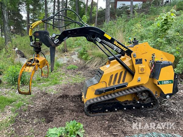 Banddriven Kompaktlastare Vermeer S925TX med stubbfräs och skopa
