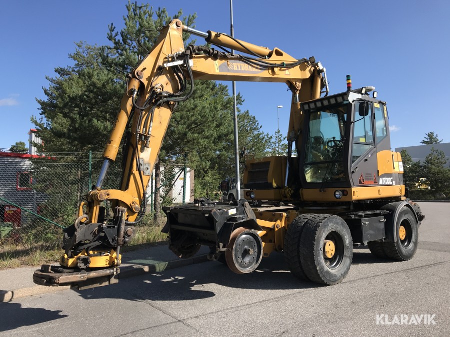 Grävmaskin för rälsarbete