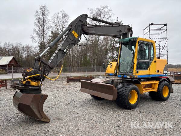 Grävmaskin Volvo EW140B med tiltrotator, tippkärra och 7 st redskap