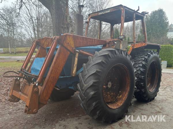 Traktorgrävare Ford County 964