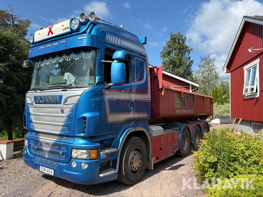 Lastväxlare Scania R730 med flak och släp