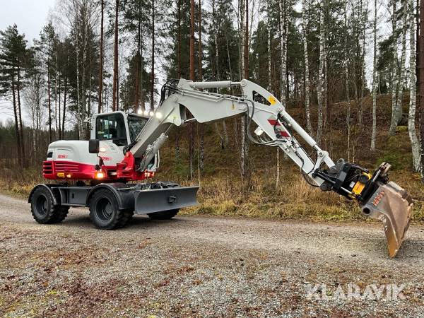 Grävmaskin Takeuchi TB295W med tiltrotator och skopa