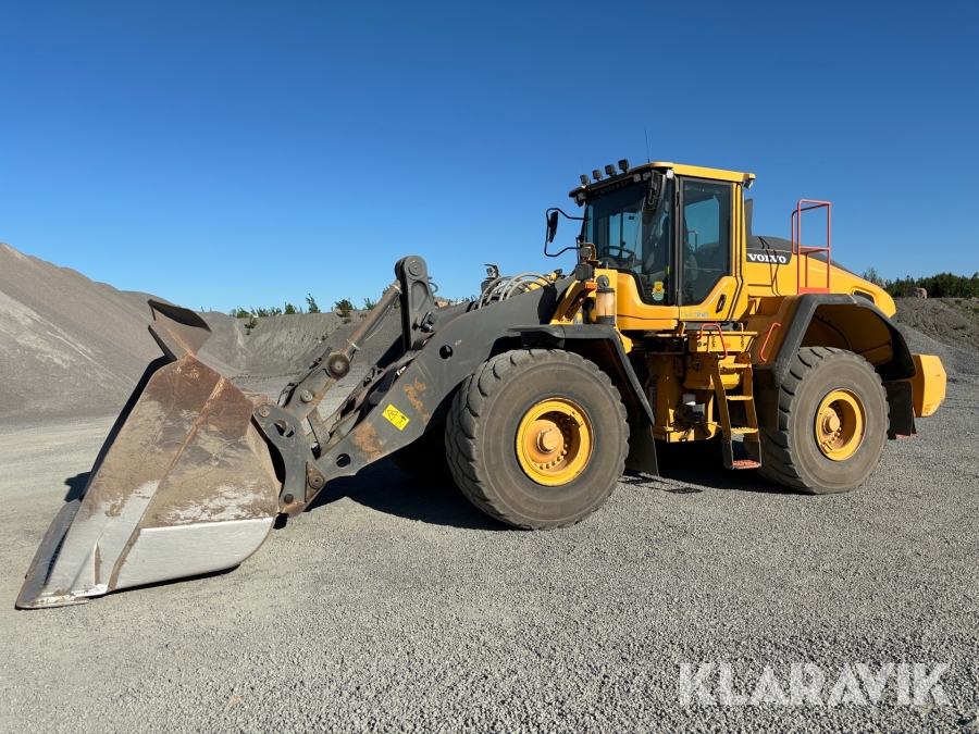 Hjullastare Volvo L180H med skopa och våg