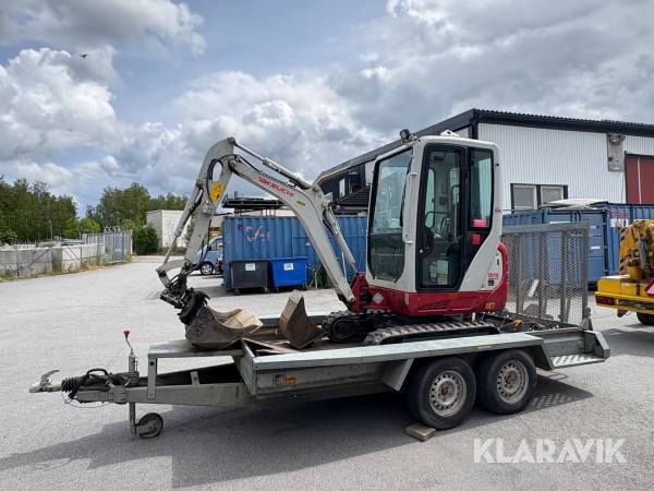 Grävmaskin Takeuchi TB216 med redskap och trailer