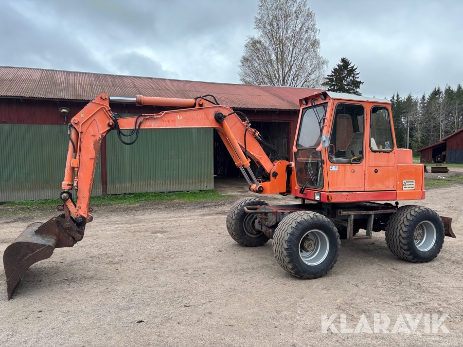 Grävmaskin Atlas 1104 med flera skopor