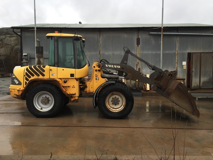 Kompakthjullastare Hjullastare med planeringsskopa