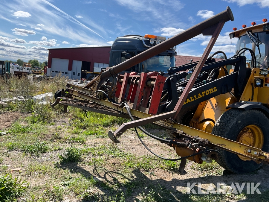 Stegmatare / bergborrsmaskin anpassad för grävmaskin