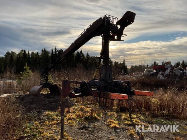 Timmerkran med skopa Cranab 5000