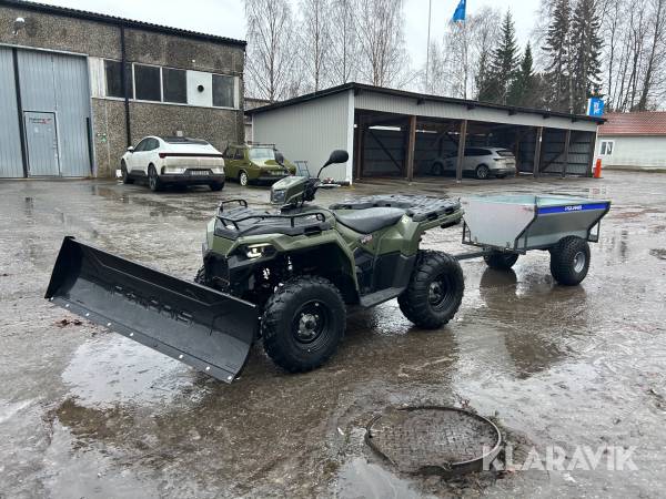 Fyrhjuling Polaris Sportsman 570 med plog och gårdsvagn