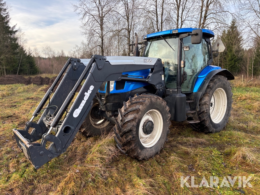 Traktor New Holland TS 135A 4WD med Quicke Q65 lastare