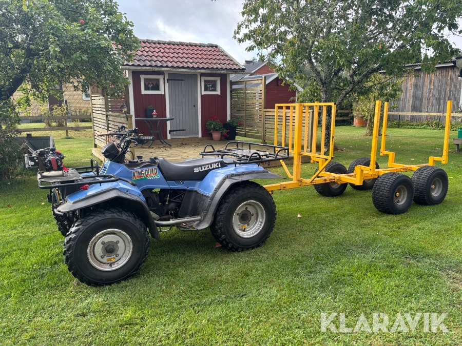 ATV Suzuki King Quad LT-F4WDX med skogsvagn