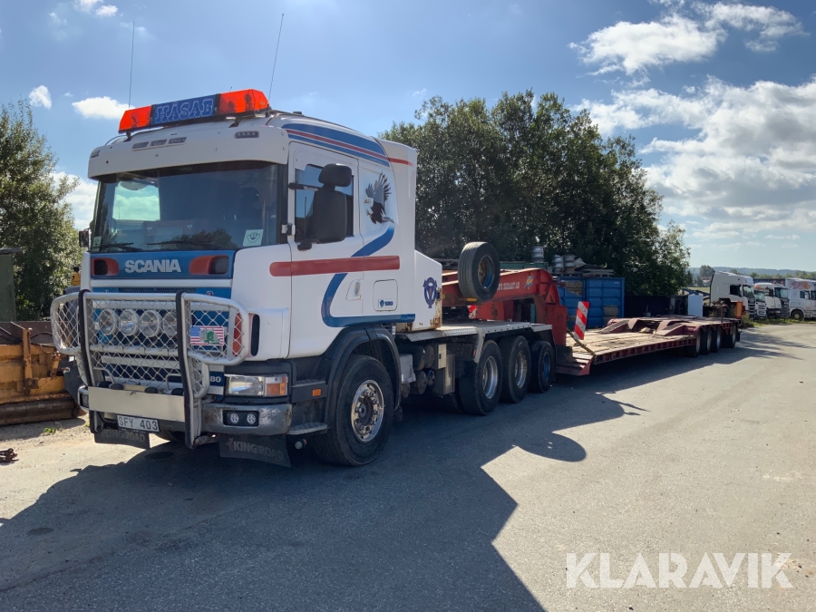 Tungdragare Scania R164 med maskintrailer