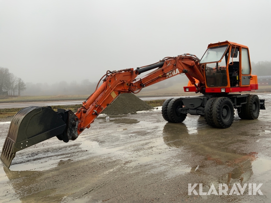 Grävmaskin Attila 1302E med skopa