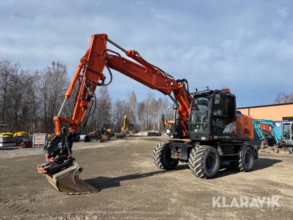 Grävmaskin Hitachi ZX140W-5B med tiltrotator