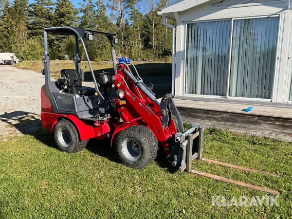 Kompaktlastare Trejon Flexitrac 1126 med redskap