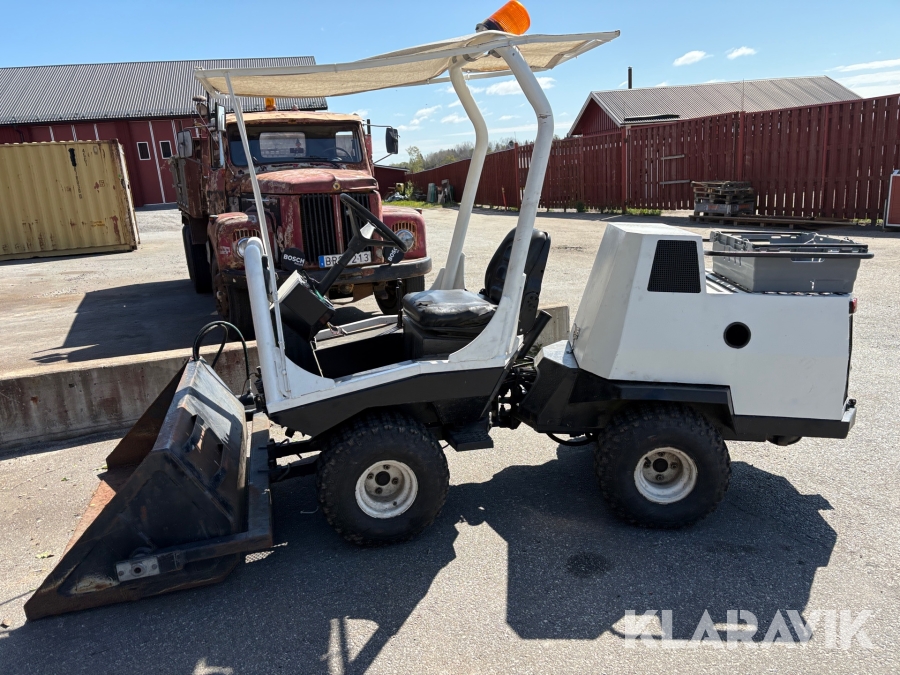 Redskapsbärare Belos med klippaggregat, slaghack, skopa