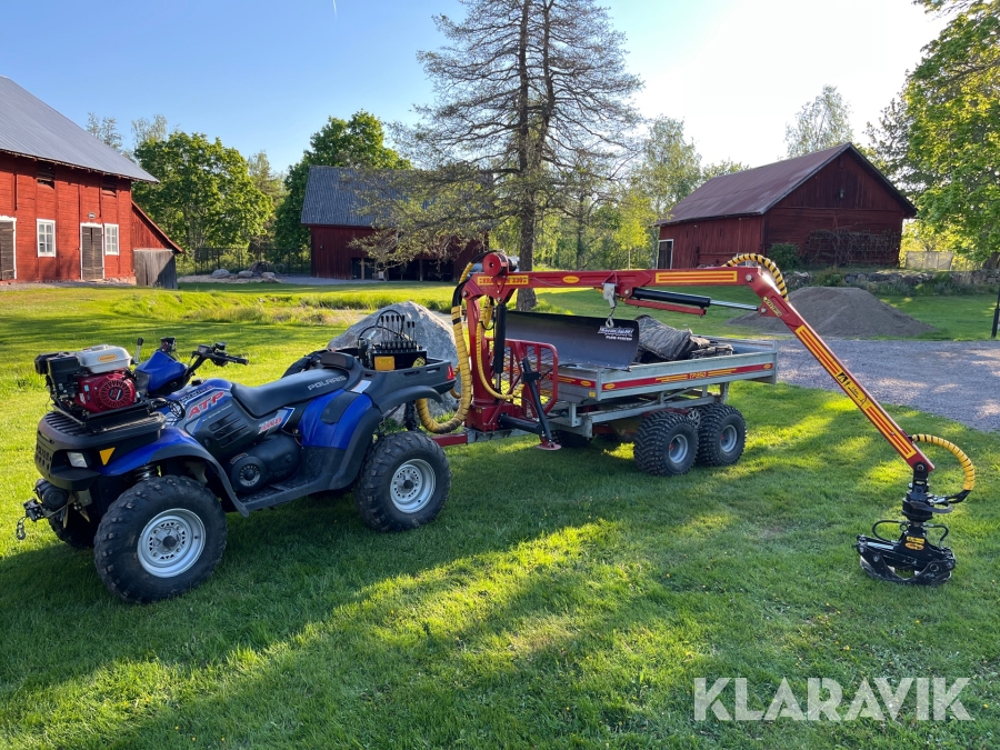 ATV med timmervagn Polaris 500