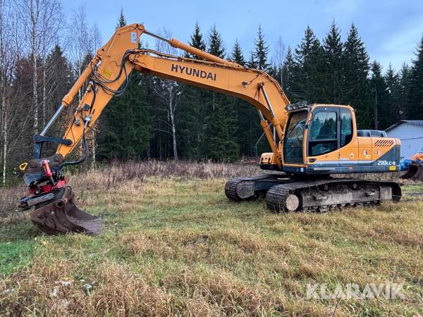 Grävmaskin Hyundai Robex 210LC-9 med tiltrotator och skopor