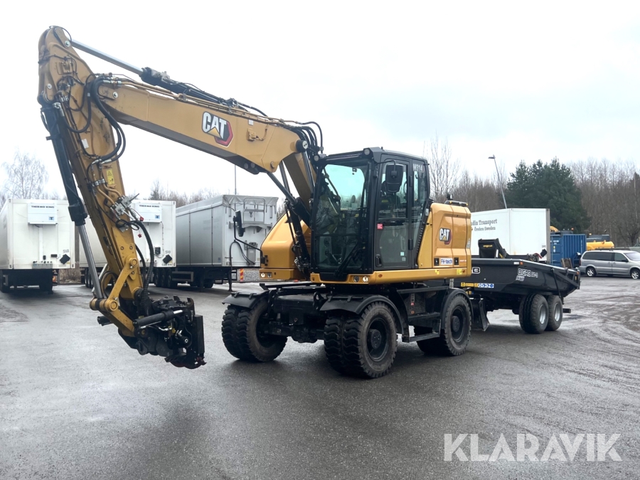 Grävmaskin CAT M314 med vagn och redskap