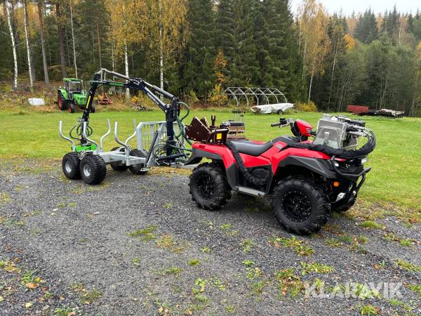 Fyrhjuling Suzuki Kingquad 4x4 500AXi med skogsvagn