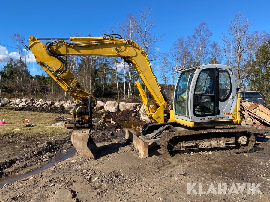 Bandgrävare New Holland / Kobelco E80-1ES Tiltrotator / 2 skopor