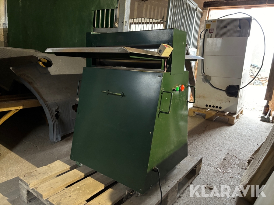 Pusselmaskin för tillverkning av pussel