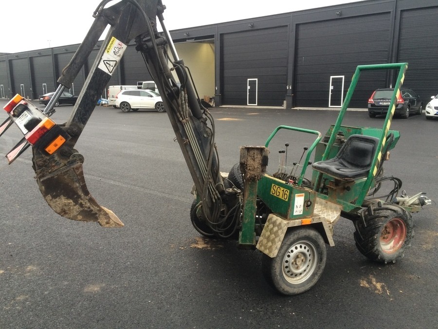 Bogserad minigrävare