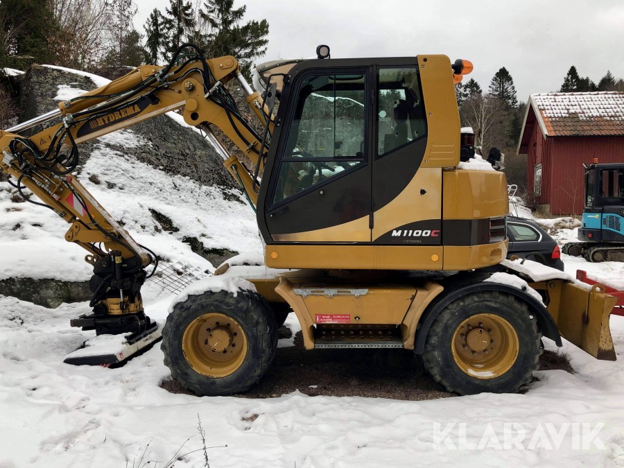 Hjulgrävare Hydrema M1100 C2 med dumperkärra & redskap