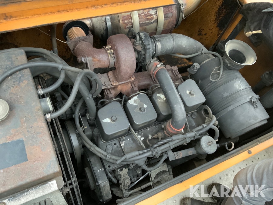 Hjulgrävmaskin Case Poclain 788 med tiltrotator