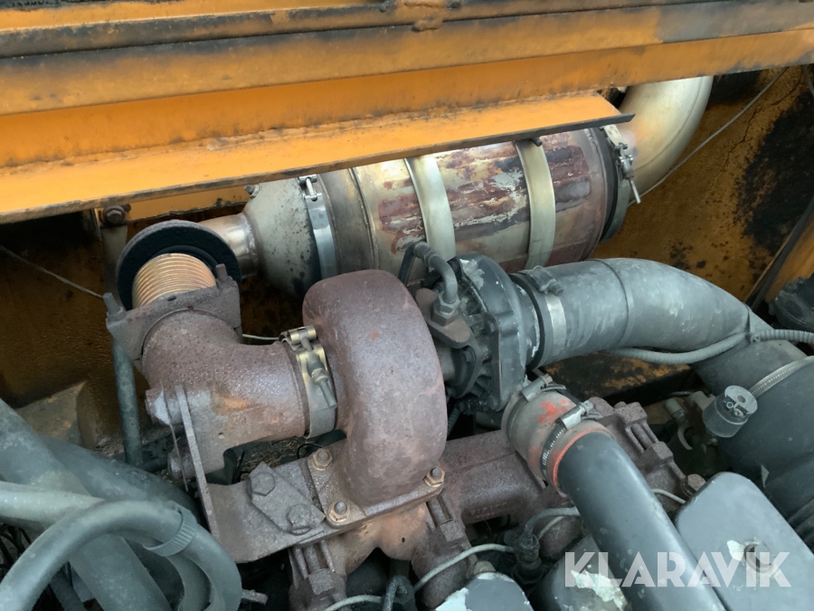 Hjulgrävmaskin Case Poclain 788 med tiltrotator