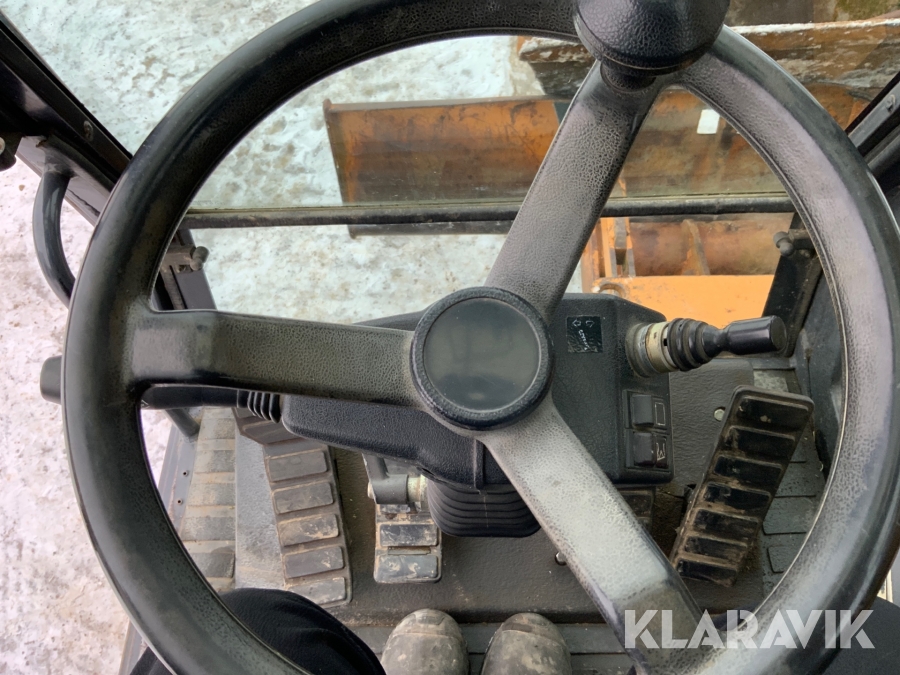 Hjulgrävmaskin Case Poclain 788 med tiltrotator