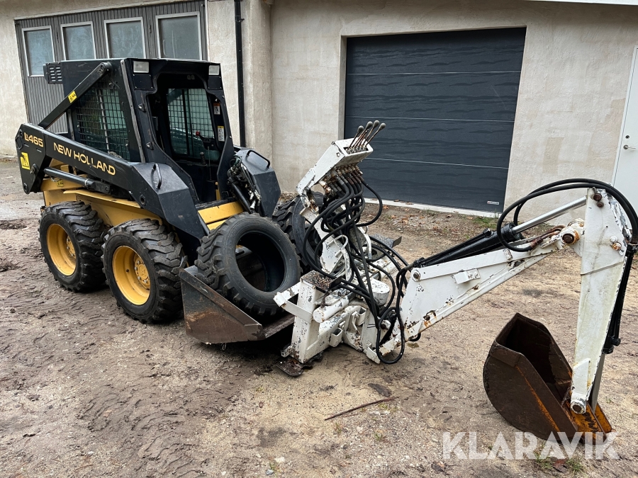 Kompaktlastare New Holland LX465 med grävaggregat och skopa
