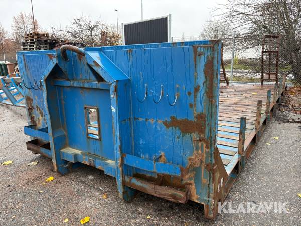 Maskinflak med containerfäste