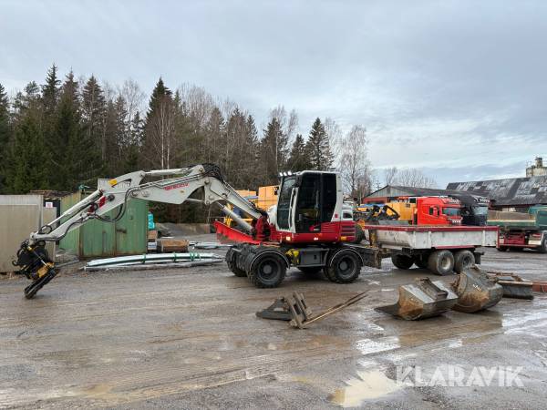 Grävmaskin Takeuchi TB295W med tippvagn och redskap