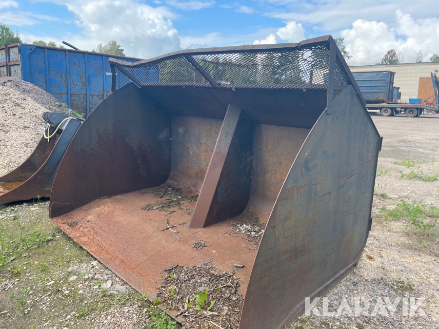 Högtippande flisskopa  