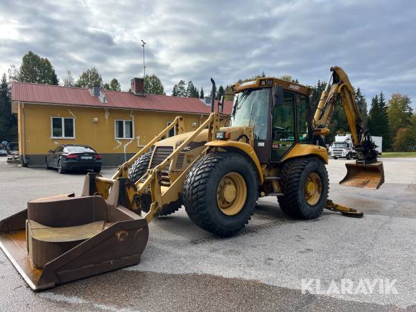 Grävlastare Hydrema 906C med tiltrotator och redskap