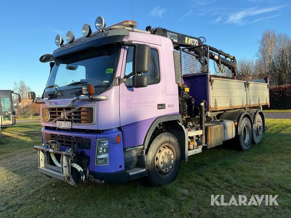 Kranbil Volvo FM9 med tipp och plogutrustning