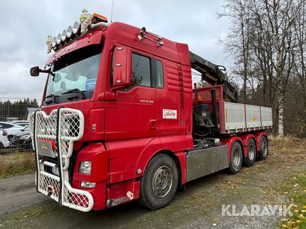 Lastväxlare MAN TGX 35.500 med kranflak och sprider