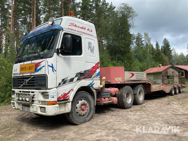 Dragbil Volvo FH12 6x4 Ombyggd B med maskintrailer