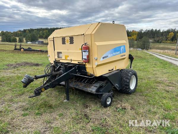 Rundbalspress New Holland BR560 A Cropcutter