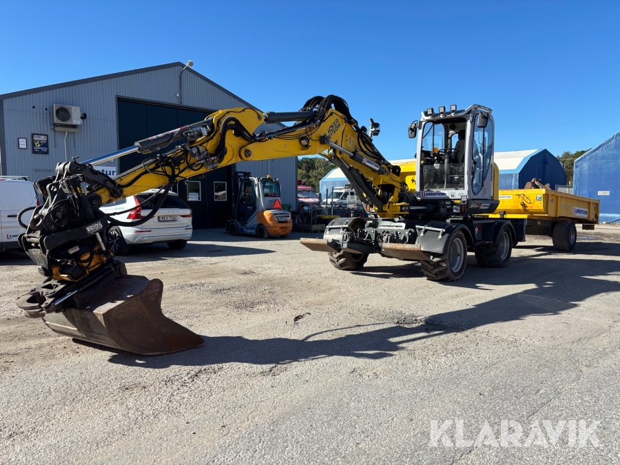 Grävmaskin Wacker Neuson EW100 med tippvagn