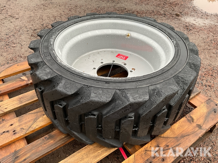 Däck med fälg 355/55D625 NHS Outrigger OTR