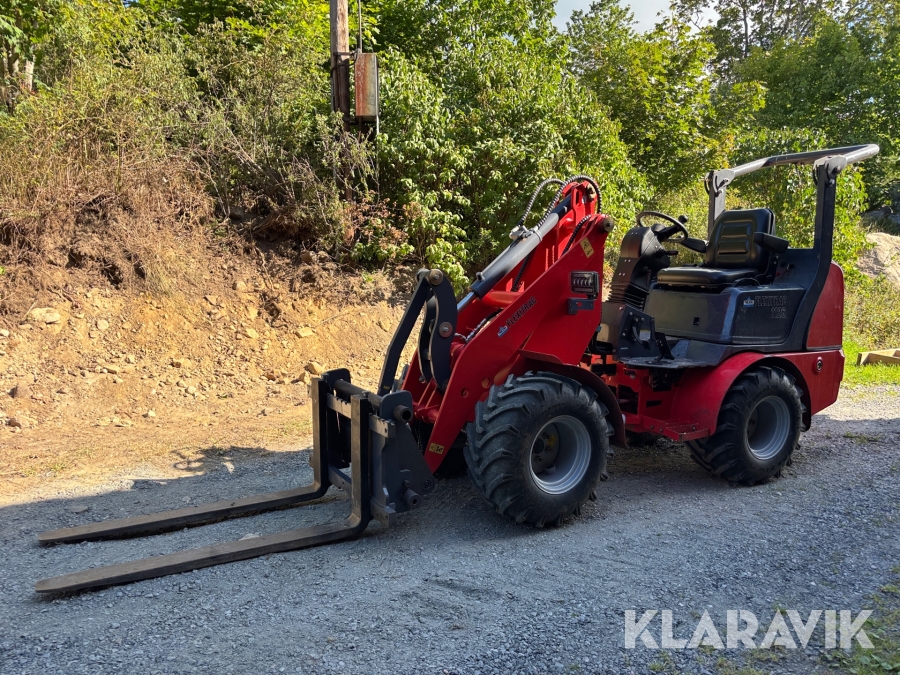 Kompaktlastare Trejon Flexitrac 1126 med redskap