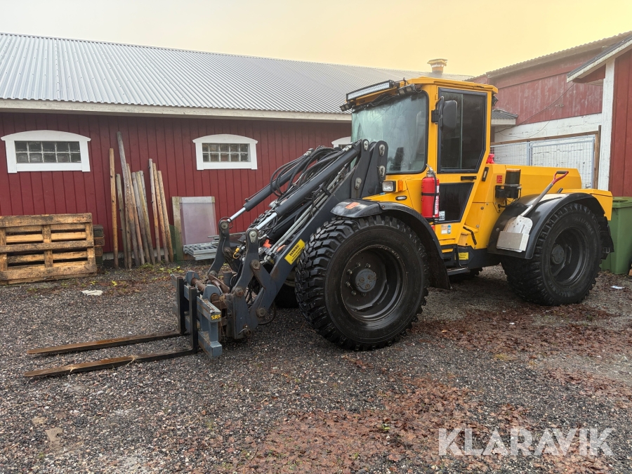 Hjullastare Lundberg 345 LSE med pallgafflar och planeringsskopa