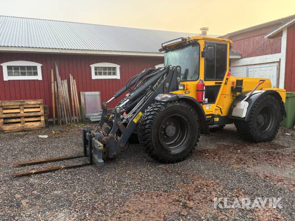 Hjullastare Lundberg 345 LSE med pallgafflar och planeringsskopa