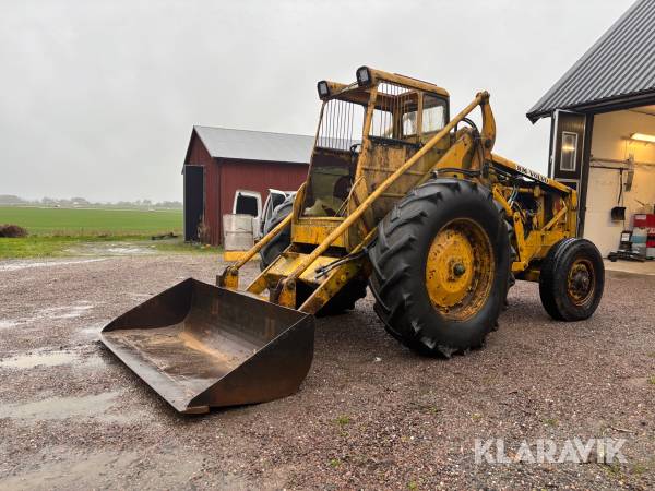 Baklastare Volvo BM LM 225 med skopa och gafflar
