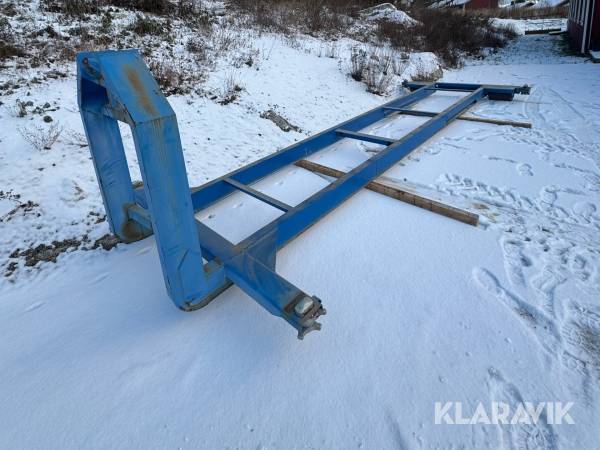 Lastväxlarram med containerfäste