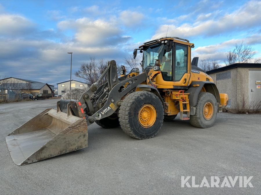 Hjullastare Volvo L90H med planeringsskopa