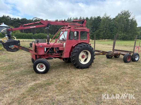 Skogstraktor Volvo BM 350 Boxer med kran & skogsvagn
