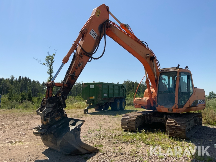 Grävmaskin Daewoo Solar 140LCV med rotor och skopa